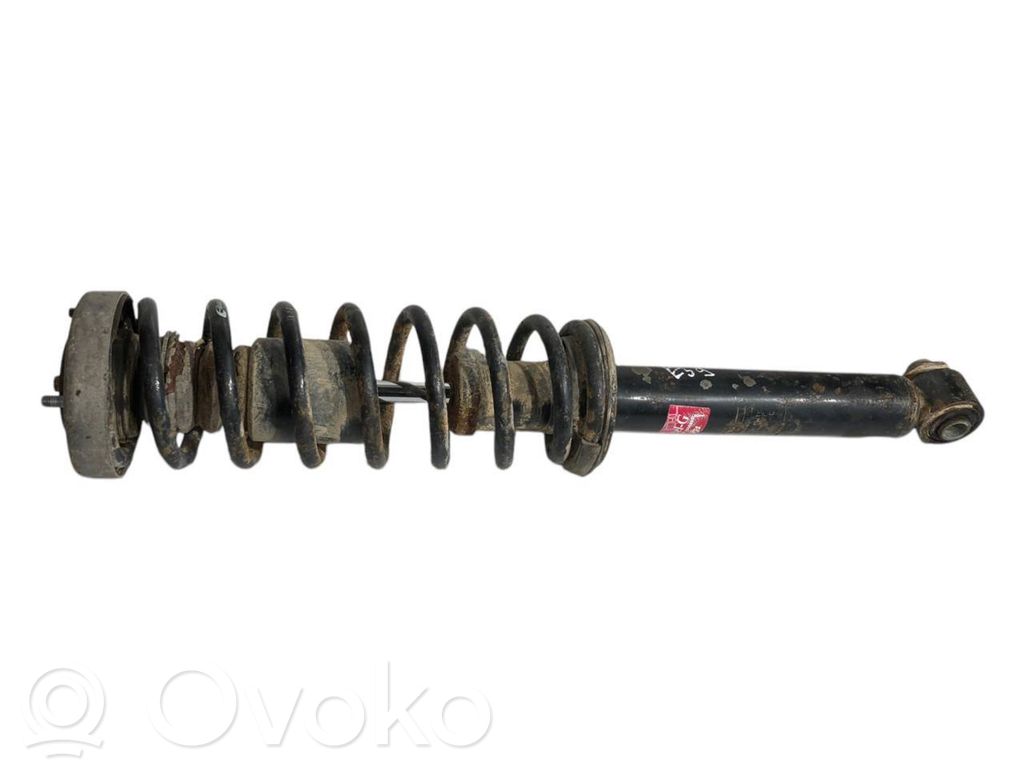 Rear shock absorber with spring