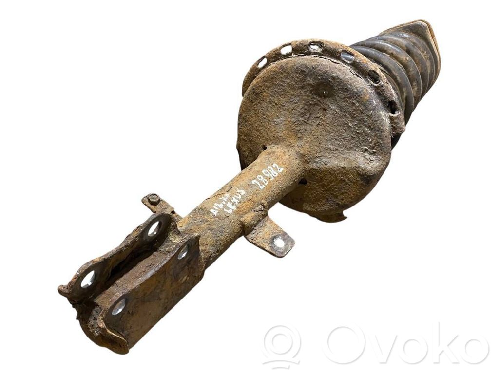 Aizmugurē amortizators ar atsperi