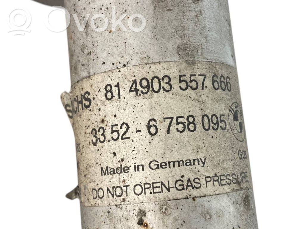 Rear shock absorber with spring