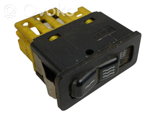 Seat heating switch