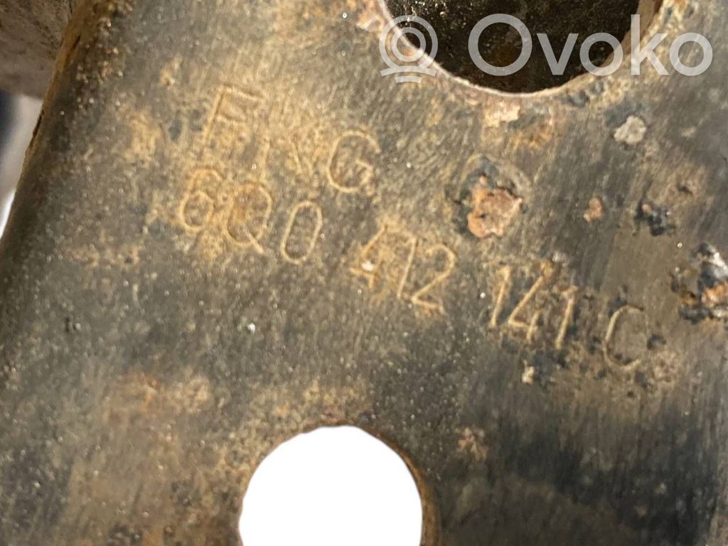 Front shock absorber with spring