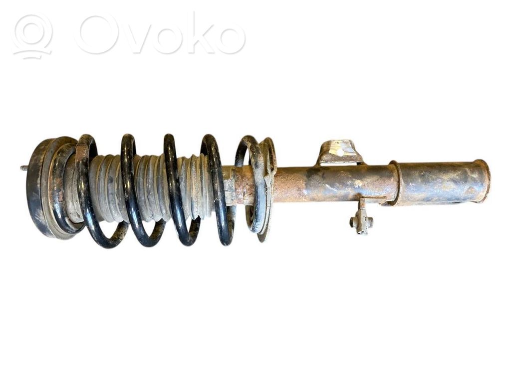 Priekšpusē amortizators ar atsperi