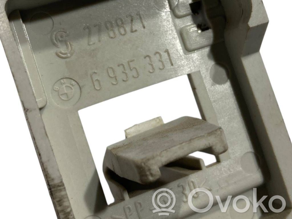 Rear lamp cover holder