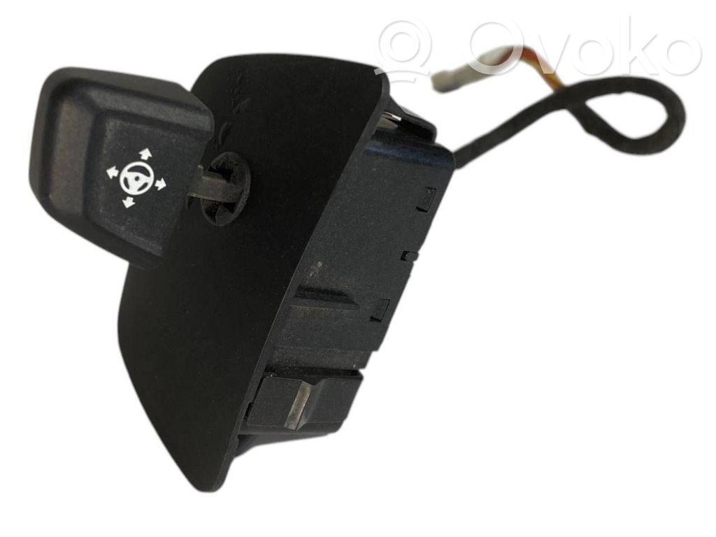 Steering wheel height control switch