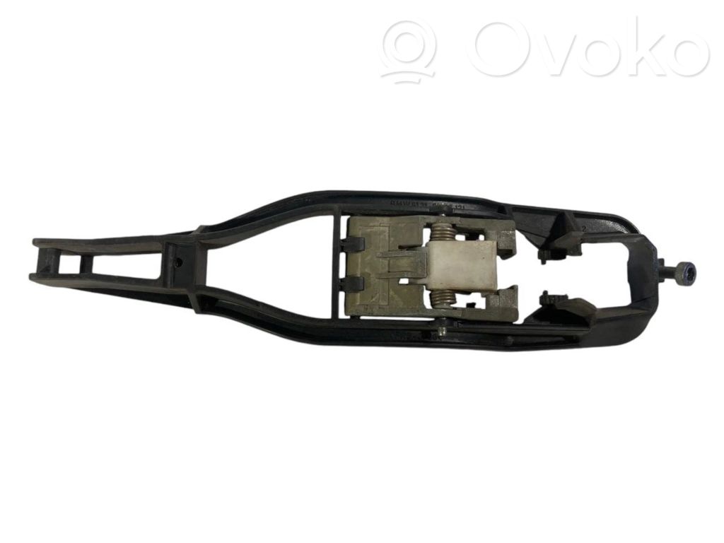 Holder/bracket for external opening handle at the front