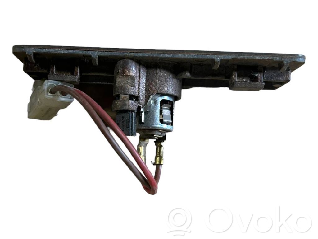 Cigarette lighter in the rear