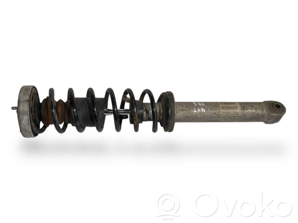 Rear shock absorber with spring