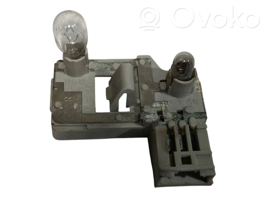 Rear lamp cover holder