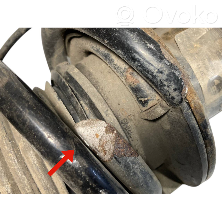 Front shock absorber with spring