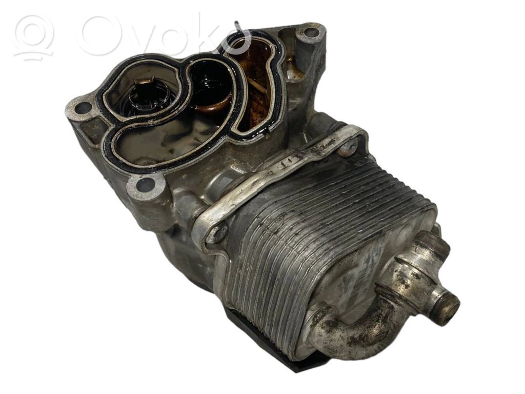 Oil filter holder/cooler