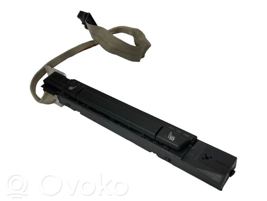 Sēdekļu apsildes slēdzis