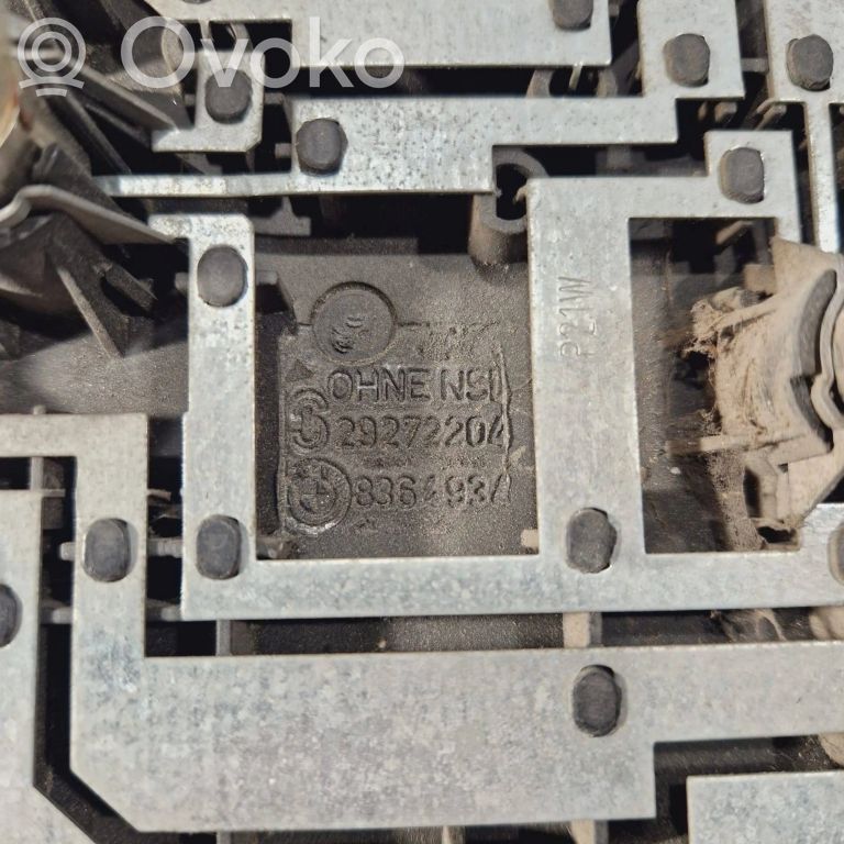 Aizmugures spuldzes vāka turētājs