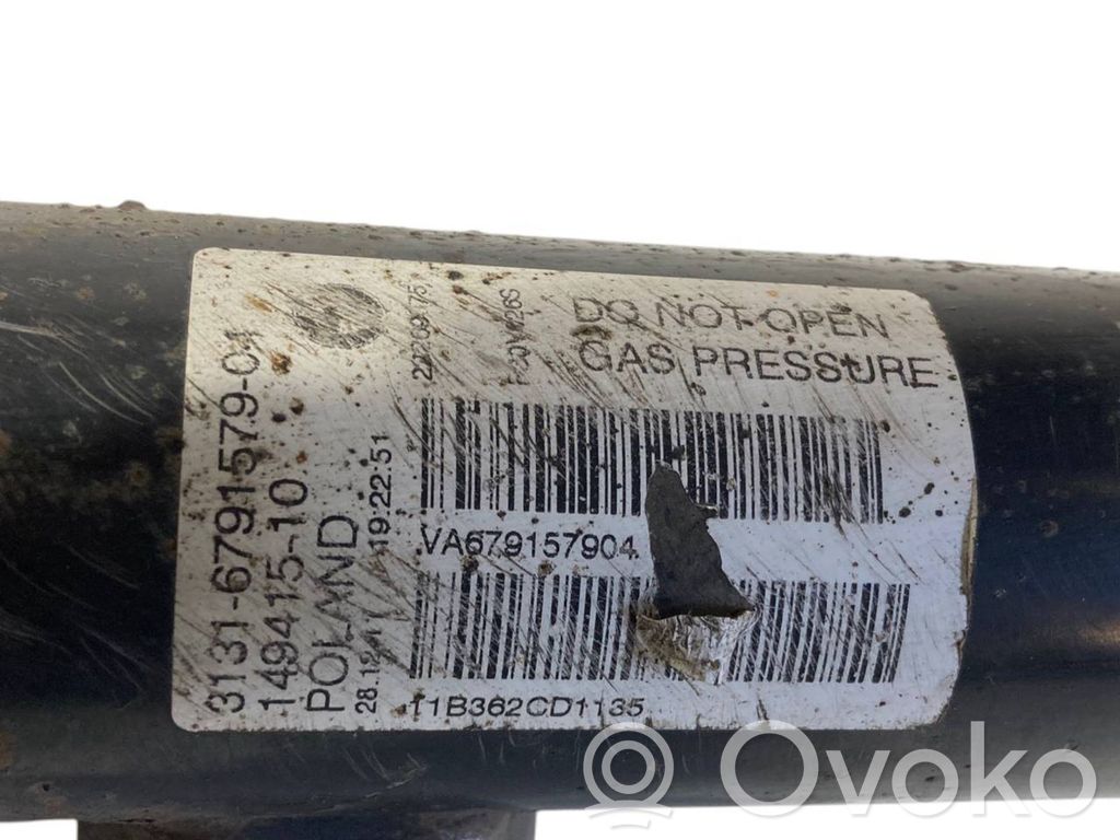 Front shock absorber with spring