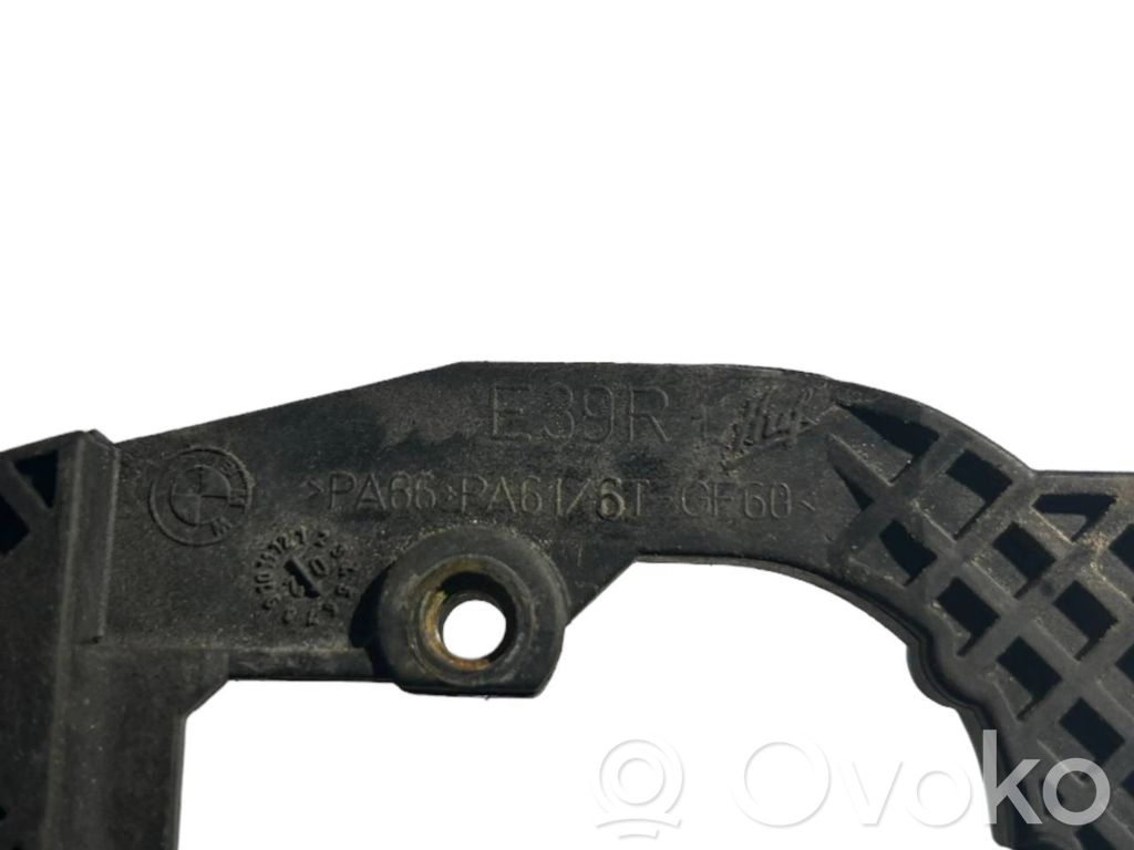 Holder/bracket for external opening handle at the front