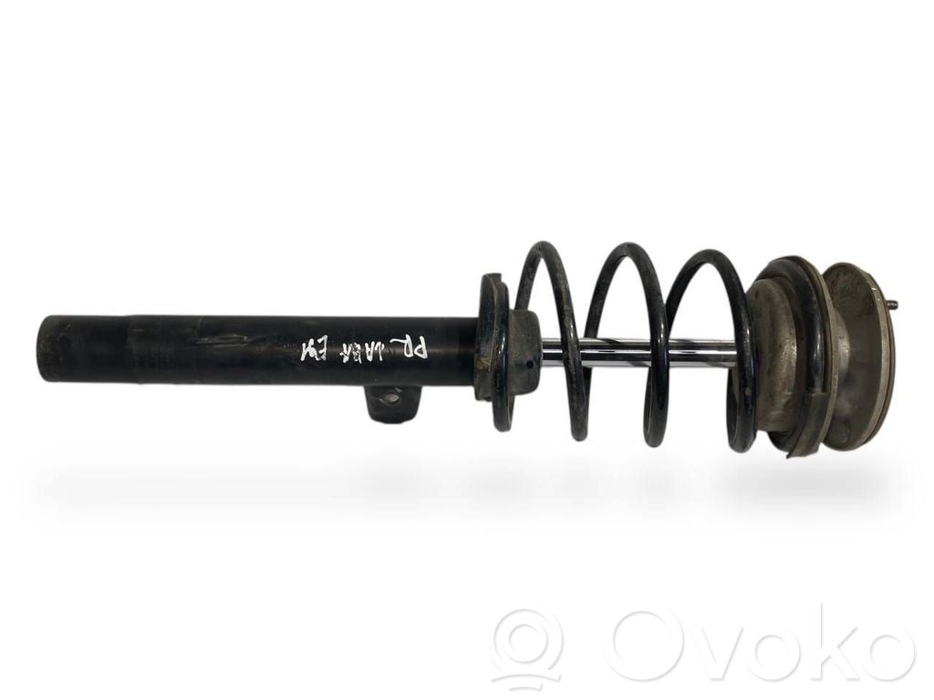 Front shock absorber with spring