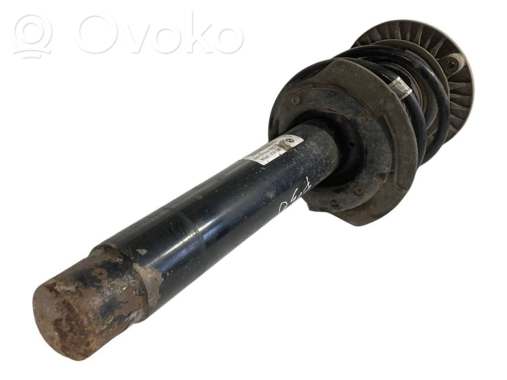 Front shock absorber with spring