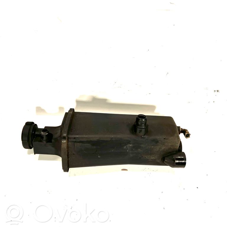 Dzesēšanas šķidruma izplešanās tvertne