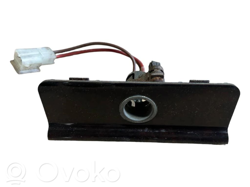 Cigarette lighter in the rear