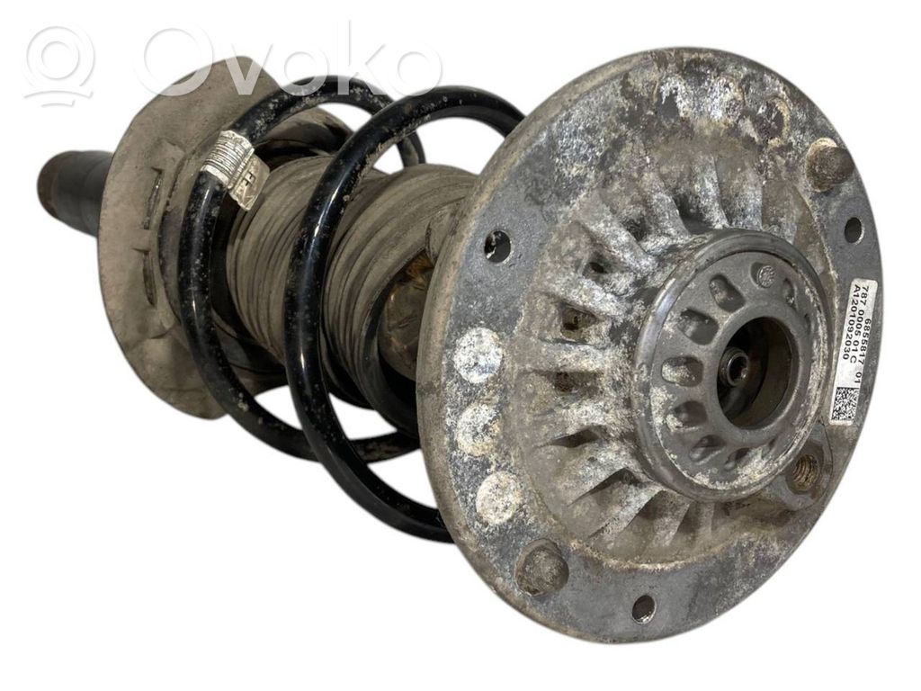 Front shock absorber with spring