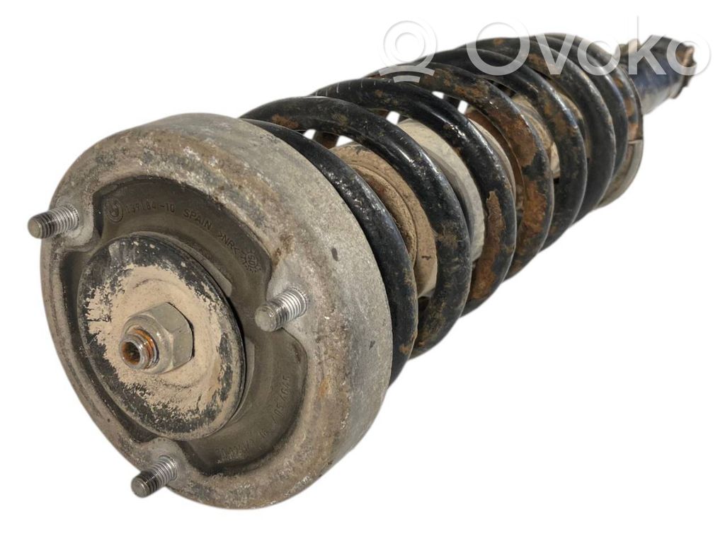 Rear shock absorber with spring