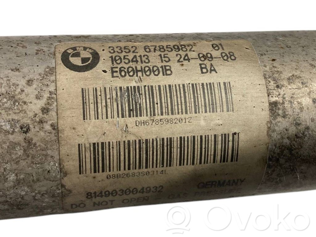 Aizmugurē amortizators ar atsperi