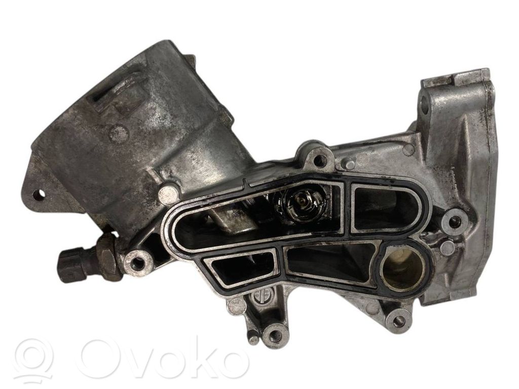 Oil filter holder/cooler