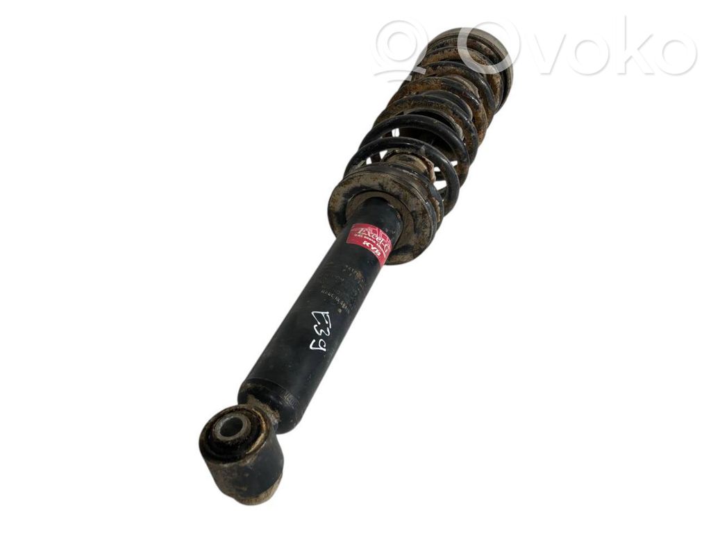 Rear shock absorber with spring
