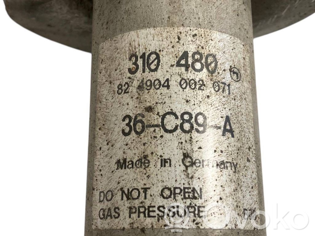 Front shock absorber with spring