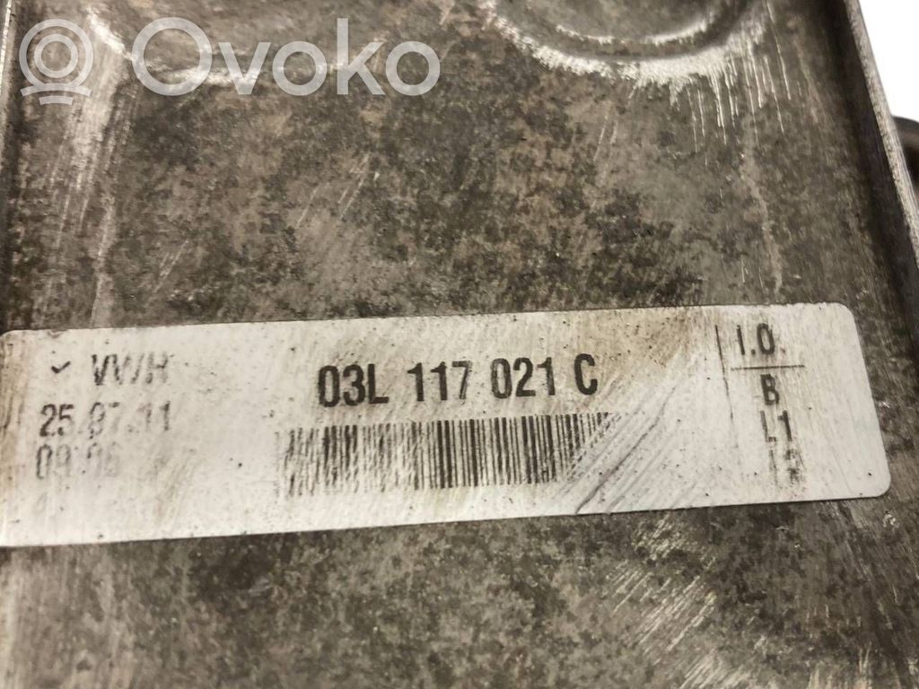 Oil filter holder/cooler