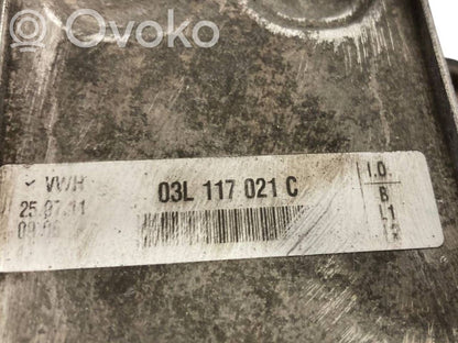 Oil filter holder/cooler