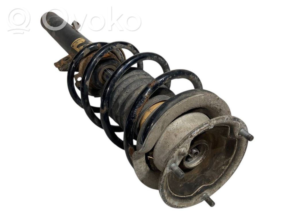 Priekšpusē amortizators ar atsperi