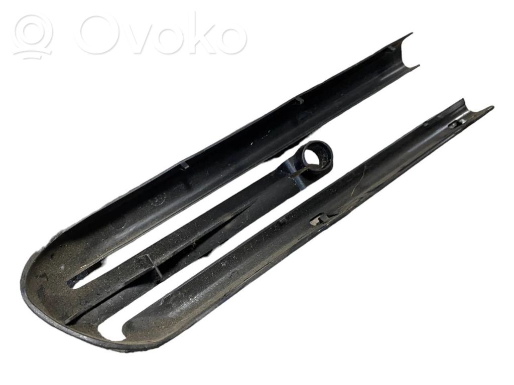 Front passenger seat rail decorative trim