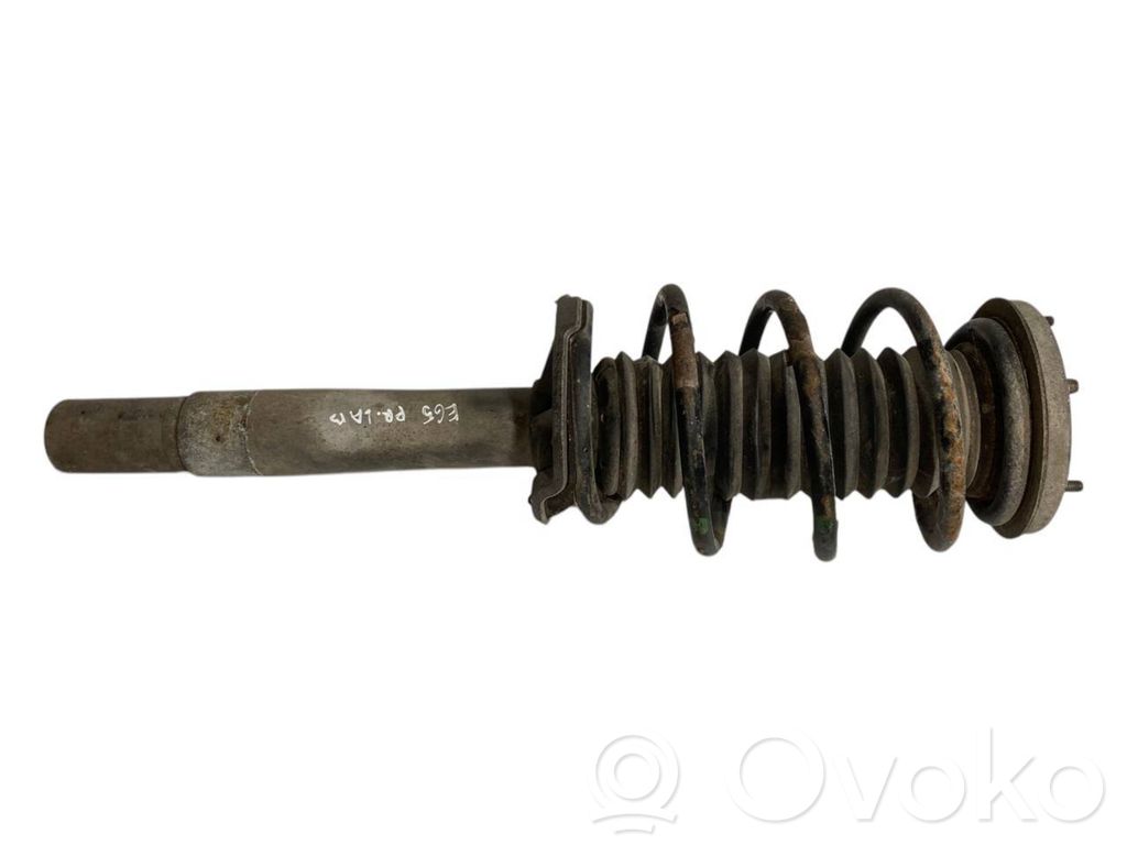 Priekšpusē amortizators ar atsperi