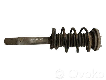 Priekšpusē amortizators ar atsperi