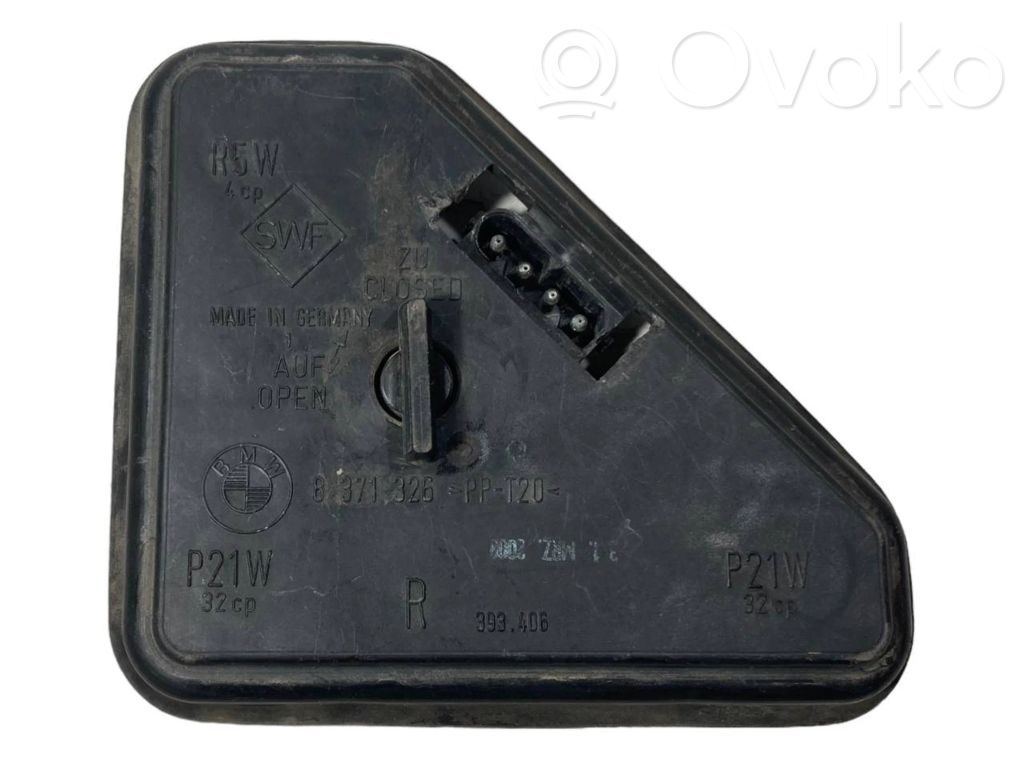 Aizmugures spuldzes vāka turētājs