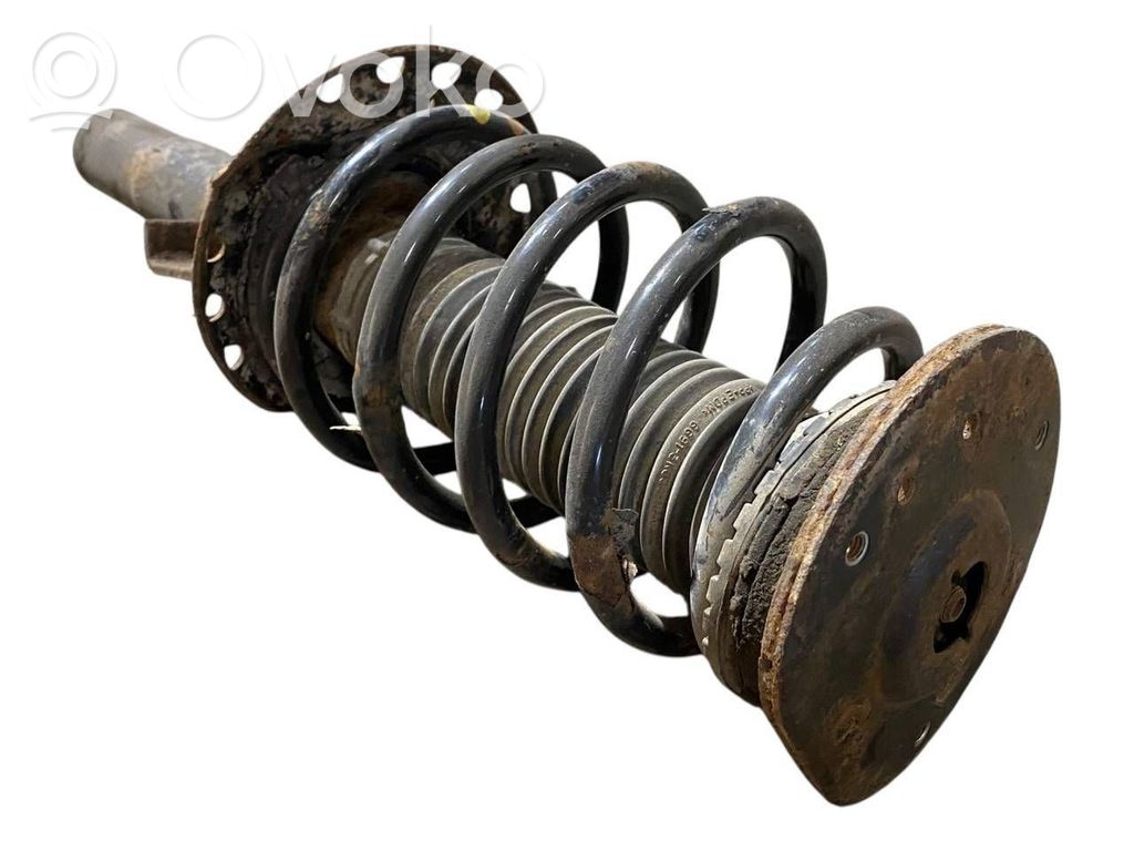 Priekšpusē amortizators ar atsperi