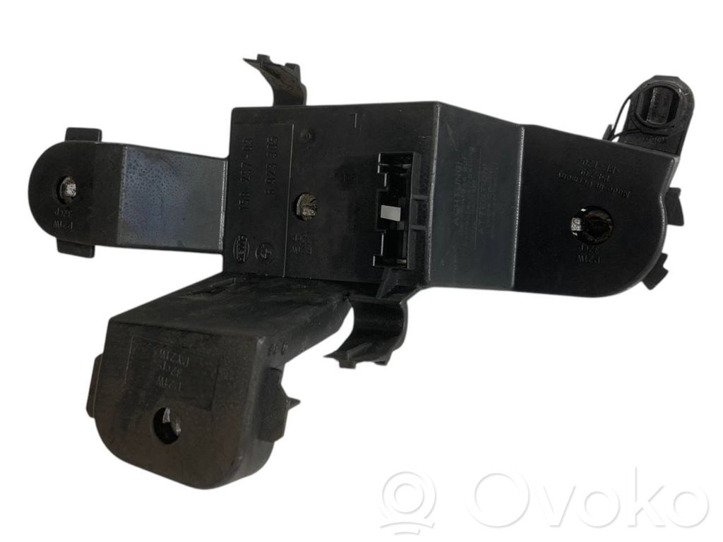 Rear lamp cover holder