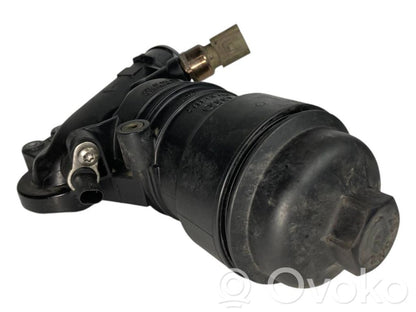 Oil filter holder/cooler