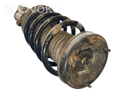 Priekšpusē amortizators ar atsperi