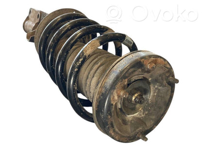 Priekšpusē amortizators ar atsperi