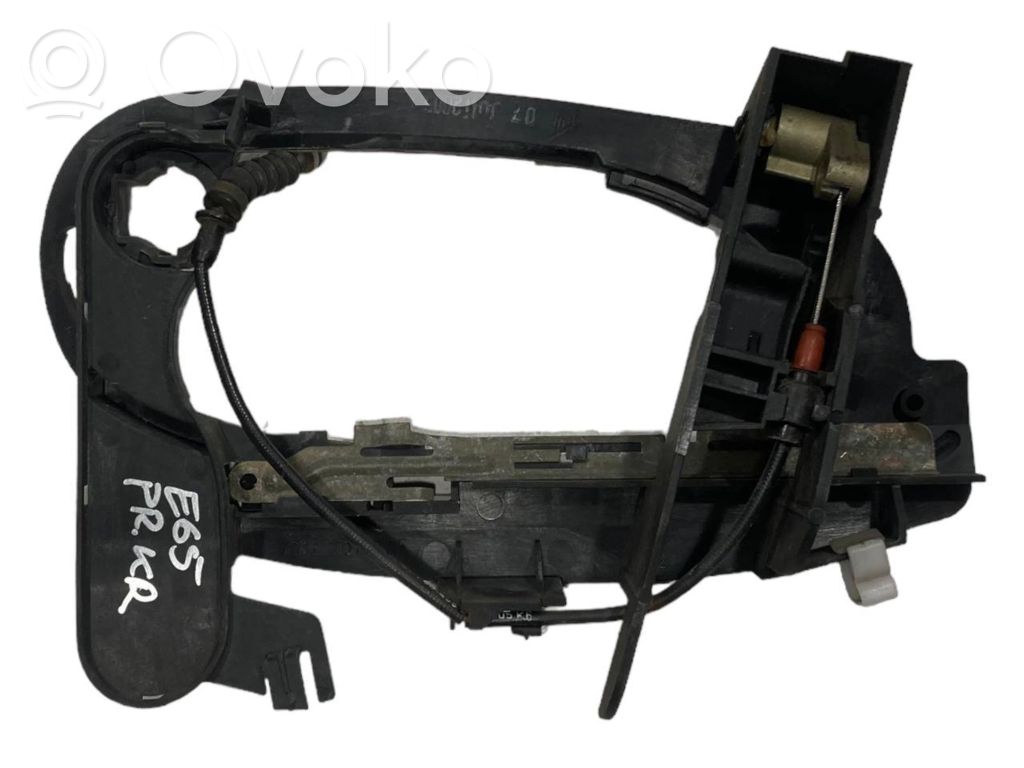 Holder/bracket for external opening handle at the front