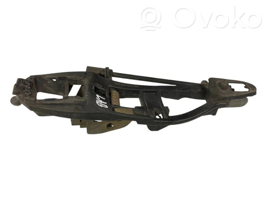 Holder/bracket for external opening handle at the back