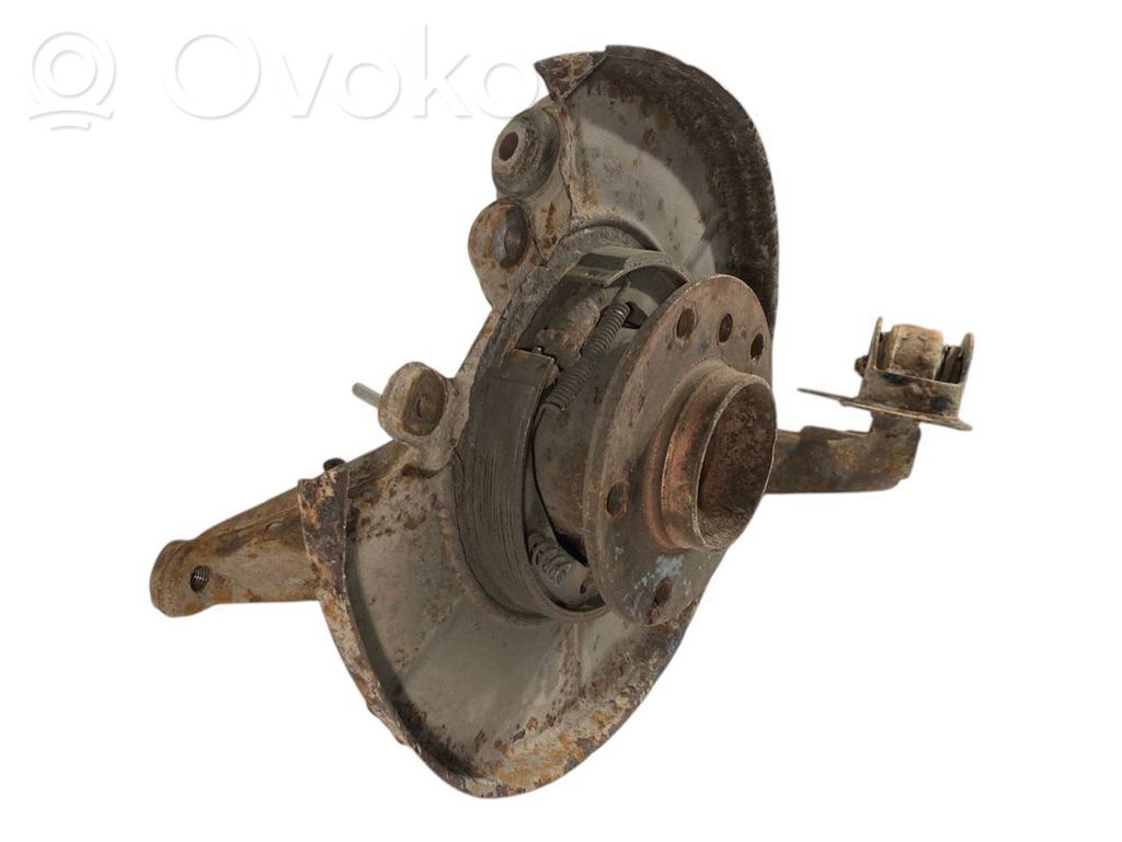 Aizmugurē riteņa rumbas vārpstas šarnīrs (stupica, capfa)