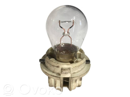 Aizmugures spuldzes vāka turētājs