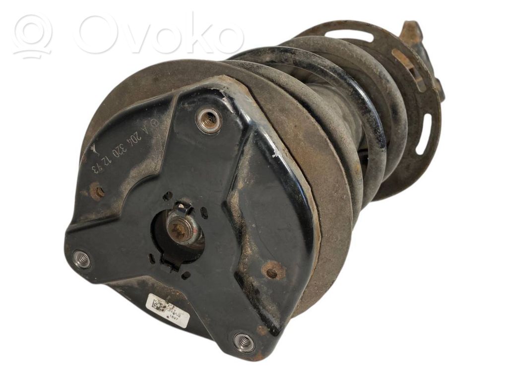 Priekšpusē amortizators ar atsperi