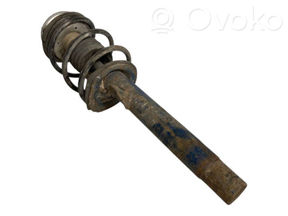 Priekšpusē amortizators ar atsperi