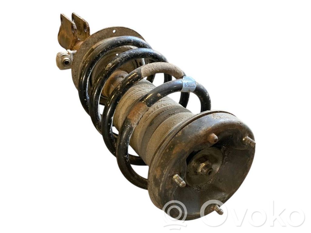 Priekšpusē amortizators ar atsperi