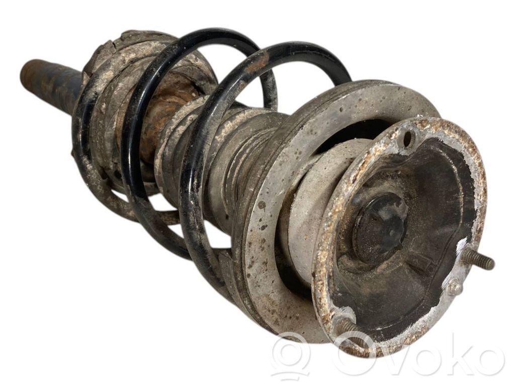 Priekšpusē amortizators ar atsperi