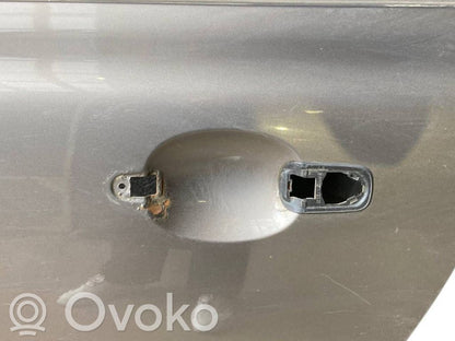 Aizmugurējās durvis