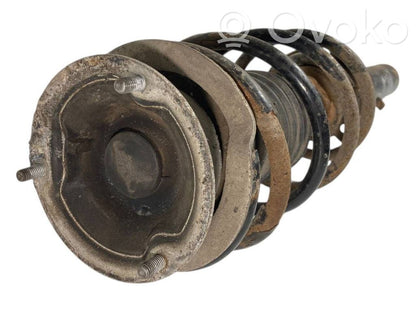 Priekšpusē amortizators ar atsperi